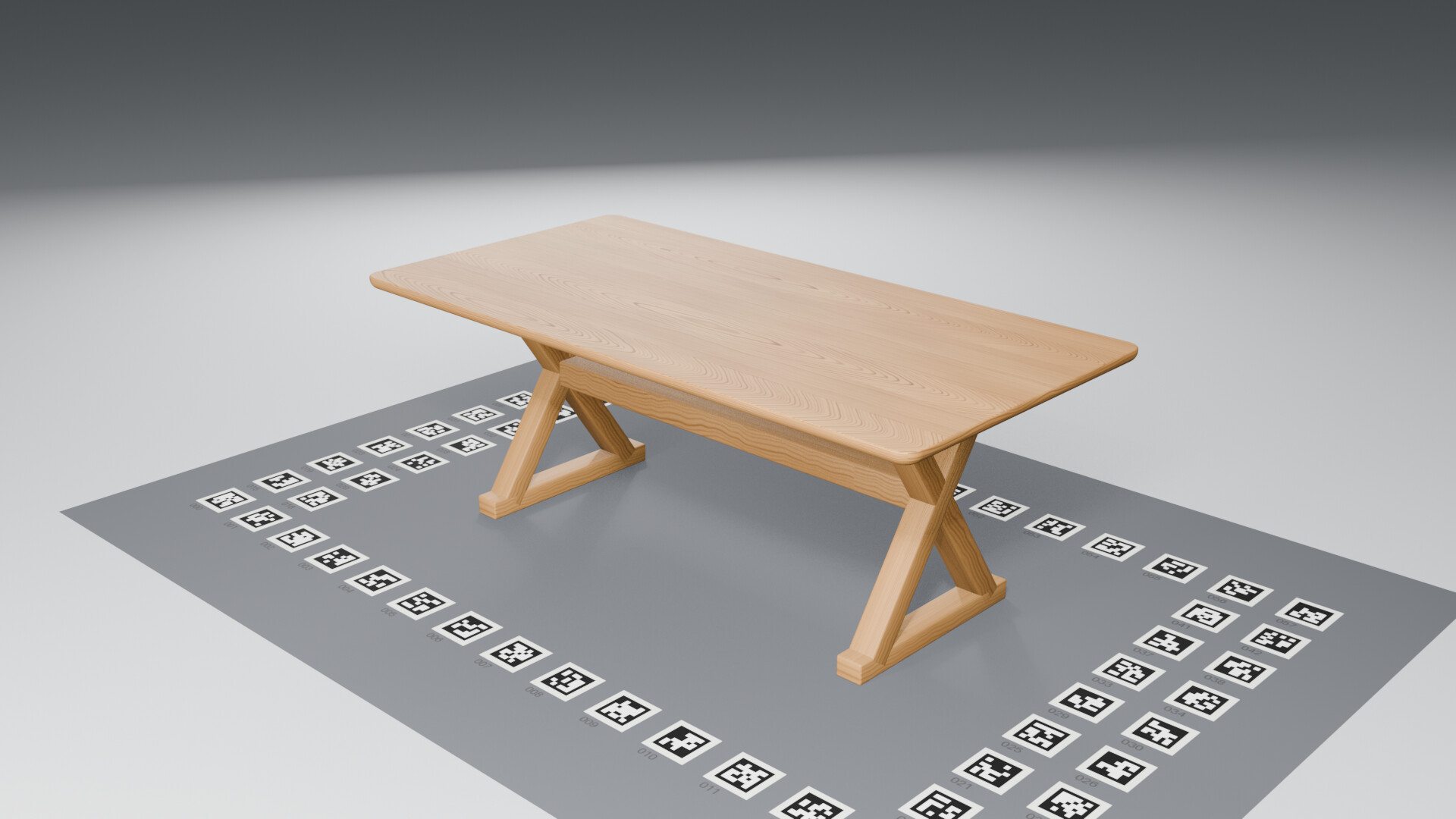 The stand-in: a 2 × 1 m solid oak table on X legs, the legs set in so the camera can reach under the edge.